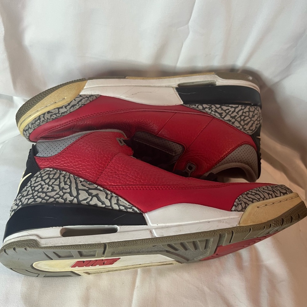 Nike Red and Black Sneakers with Iconic Elephant Print